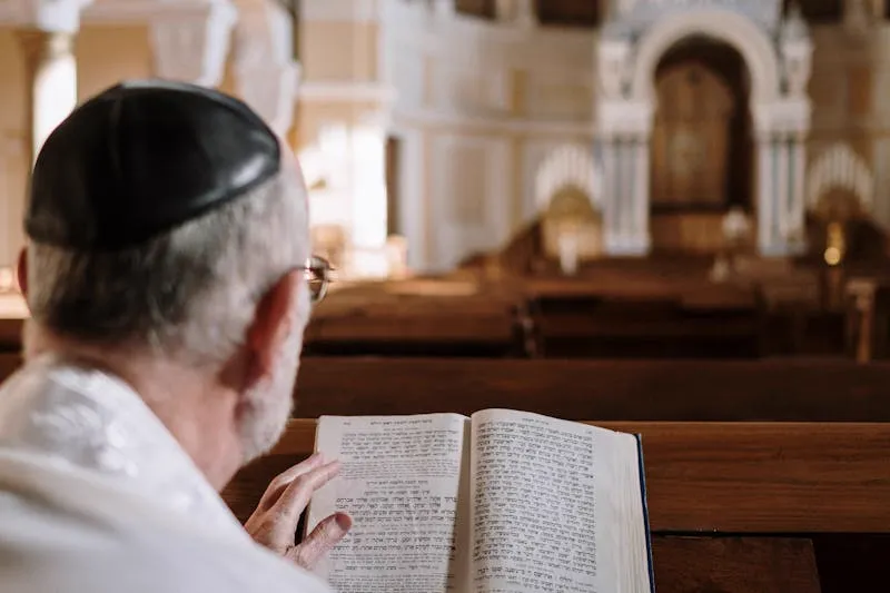 Driving a 3-inch screw through a door hinge into the wall stud
